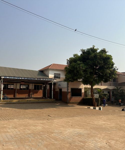 NASEC campus grounds with the school's core values displayed