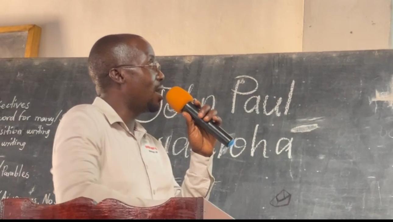 A NASEC staff member addressing students